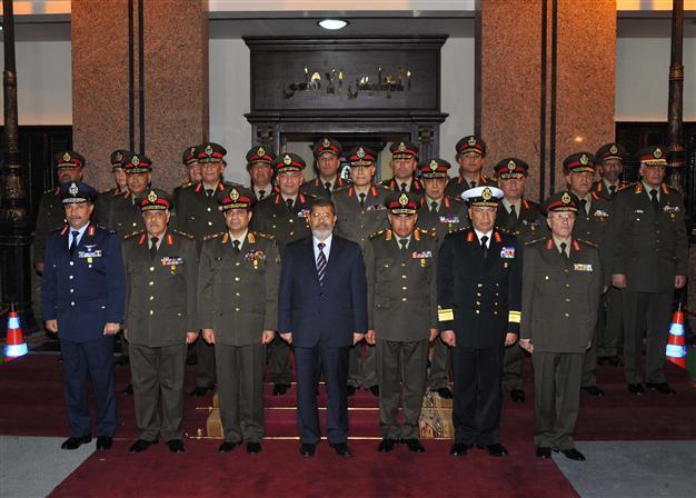 Morsi, Egypt army close ranks against abuse charges