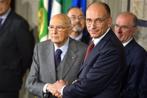 Italy unveils new government after two-month deadlock as Berlusconi becomes the key man