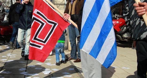 Greek police probe neo-Nazi hate speech threatening to turn immigrants into soap