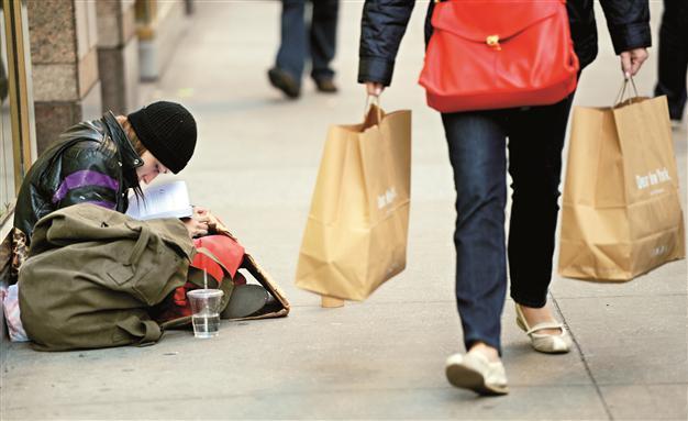 US jobless claims fall sharply to five-year low
