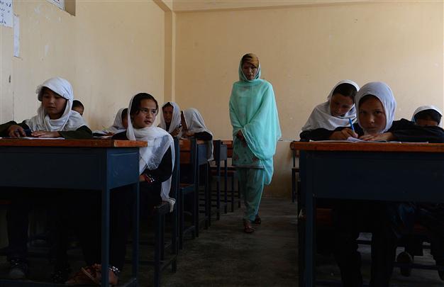 Afghan minister vows punishment for fainting girls