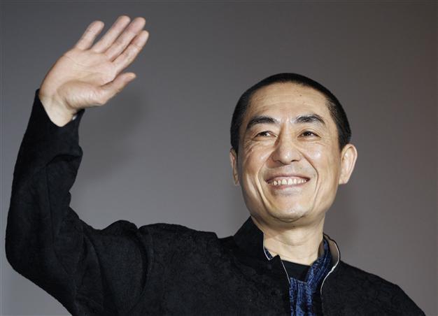 China probes reports of film director Zhang Yimous seven children