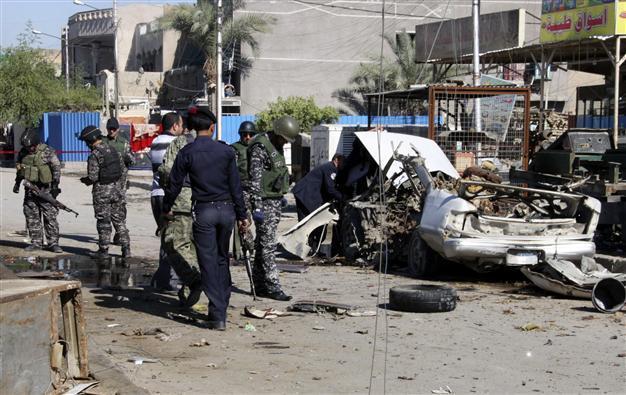 Car bombs kill 18 at Iraq Shiite mosques