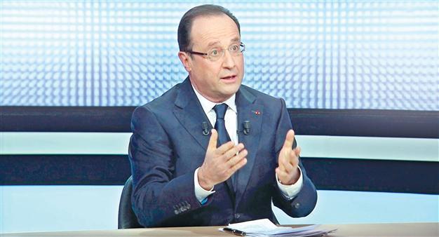 France’s Hollande unveils 75 pct wealth tax to firms