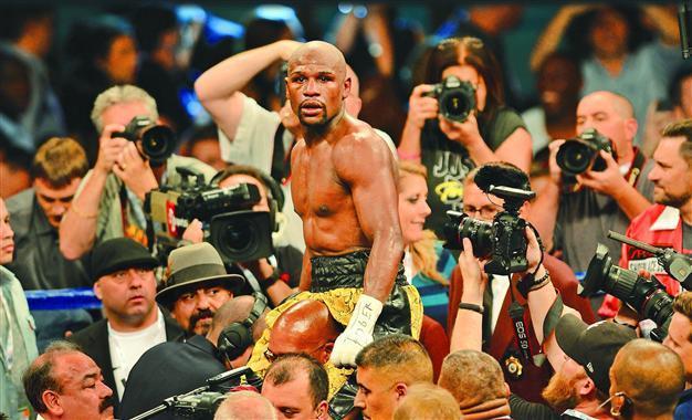 Mayweather beats Guerrero to retain title