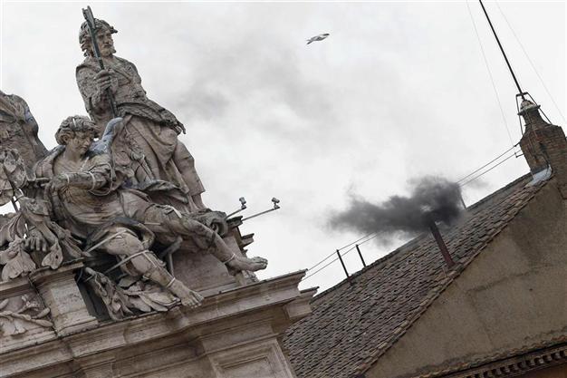 Black smoke over Vatican as morning fails to bring new pope