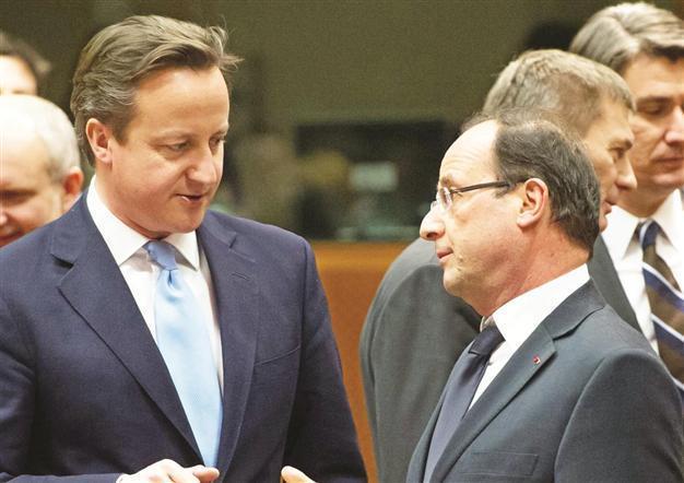 Britain, France firm on defying Syrian arms ban
