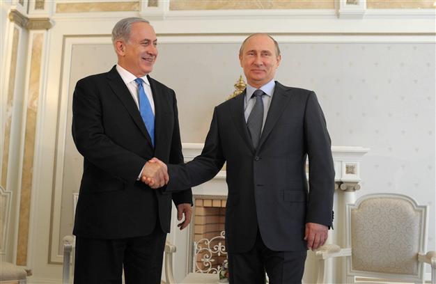 Putin warns against moves that could shake Syria