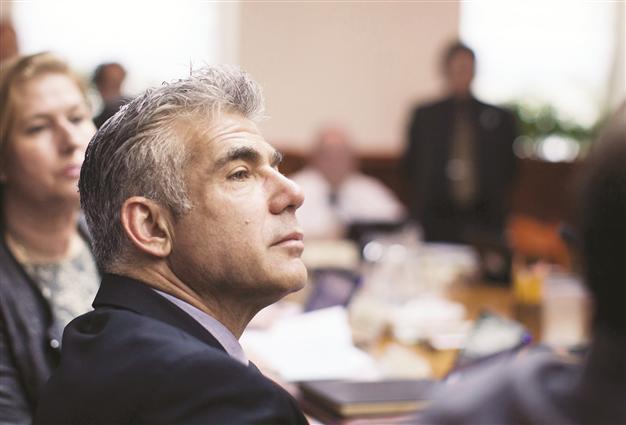 Israel OKs budget draft with large defense cuts