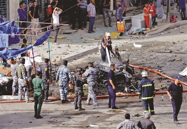 Attacks in Iraq kill over 50, sectarian tensions high