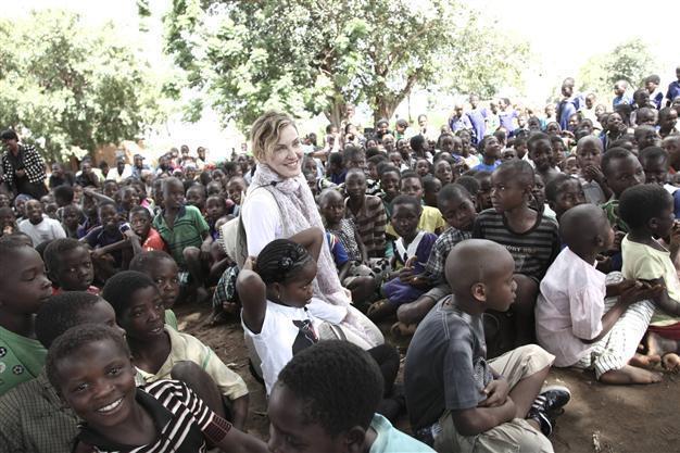 Madonna takes children to native home in Malawi