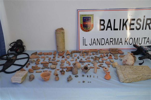 One detained as hundreds of historic artifacts found in Aegean province