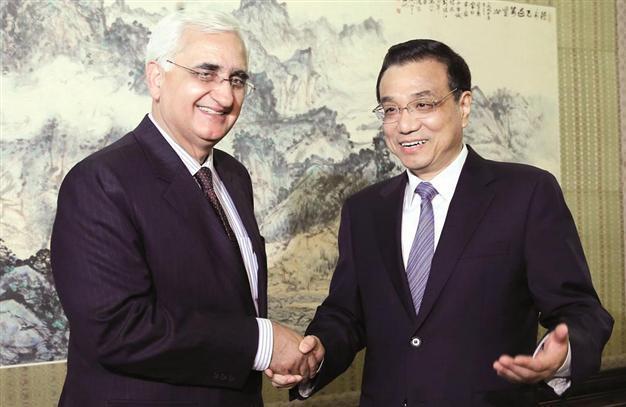 China downplays friction with India ahead of visit