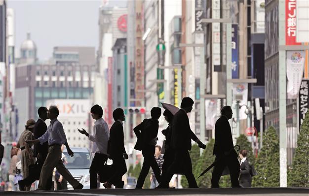 Japanese economy grows again, signaling recovery