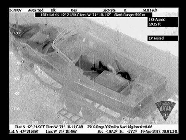 Boston bombing suspect wrote message in boat: report