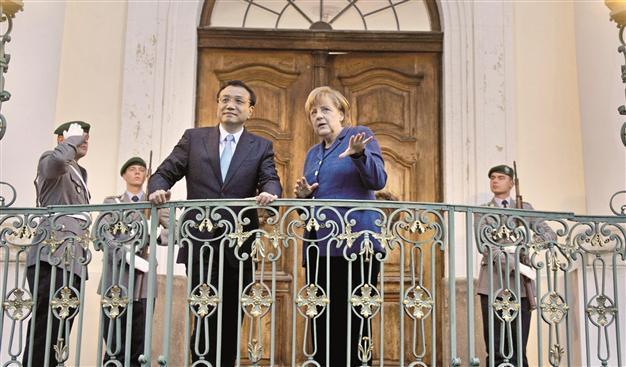 Merkel, Li vow to stop EU, China trade dispute