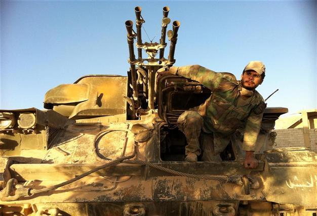 Hezbollah-backed Syria troops overrun strategic town Qusayr