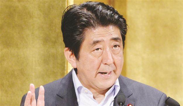 Japan PM reveals three strategies for economy
