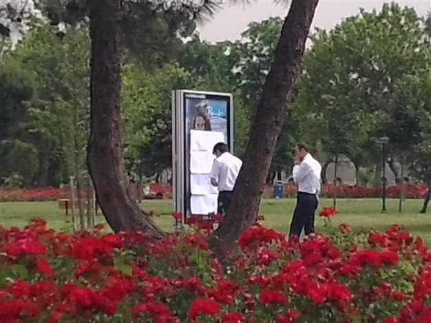 Conservative group covers bikini ad photo on campus