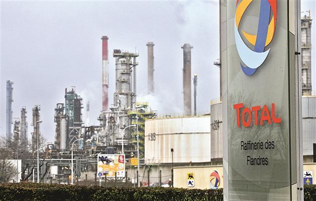 Total to pay $400 million to settle US probe over bribe