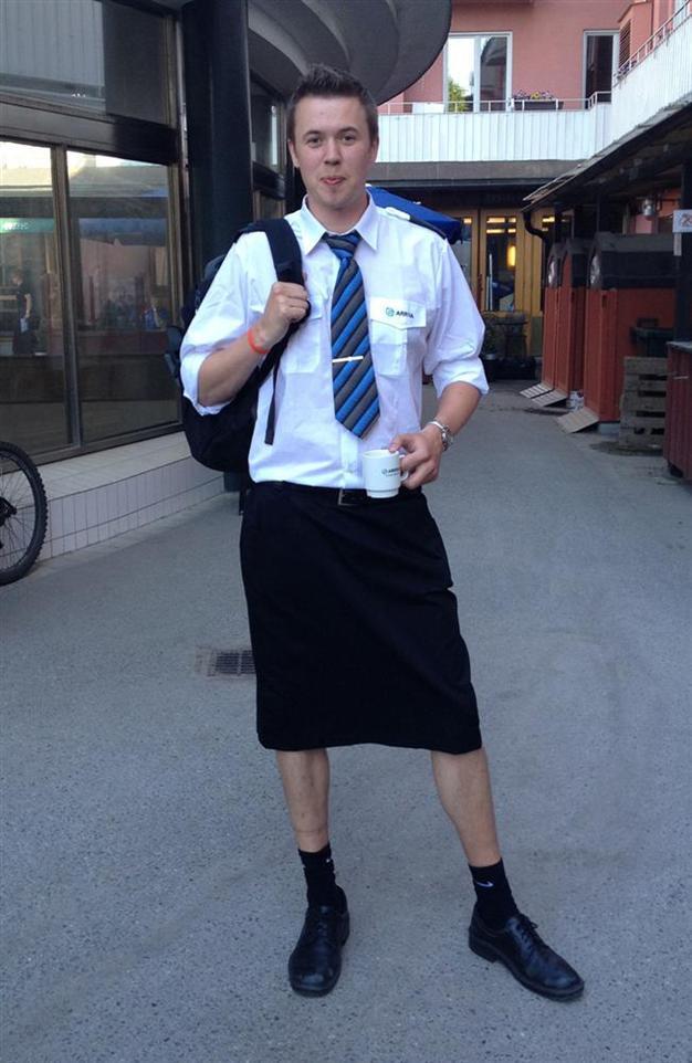 Swedish male train drivers don skirts to beat the heat