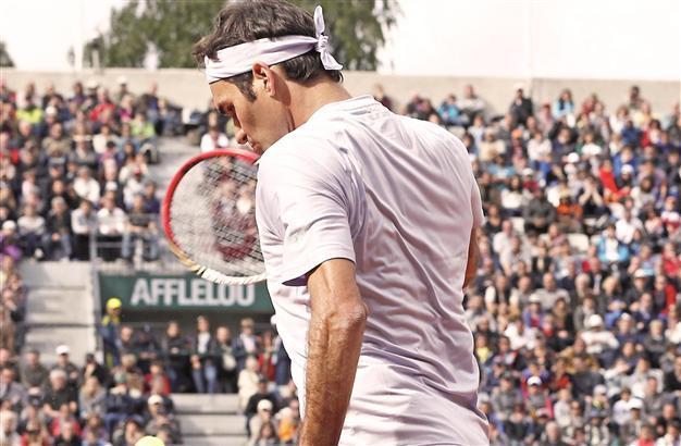 History can wait as Federer tackles Tsonga