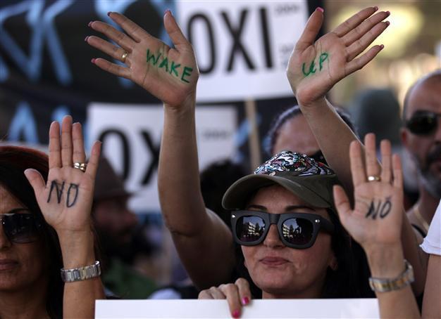 Greek Cypriot Parliament approve EU-IMF bailout deal with a razor-thin majority
