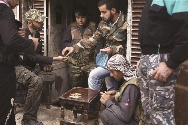 Hezbollah, rebels trade barbs over Syrian war