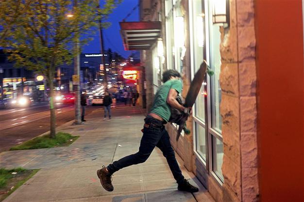 Police clash with protesters after May Day rally in Seattle