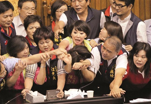 Taiwan lawmakers throw coffee in row