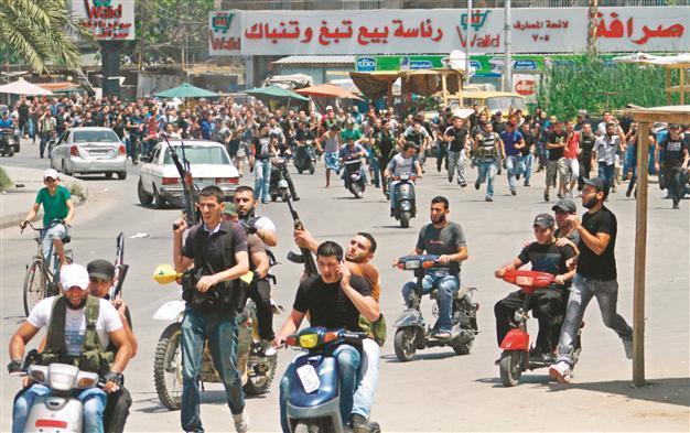 Fierce fighting rages in strategic Syrian town