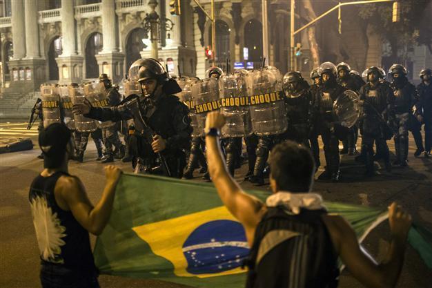 One killed as more than a million protest in Brazil
