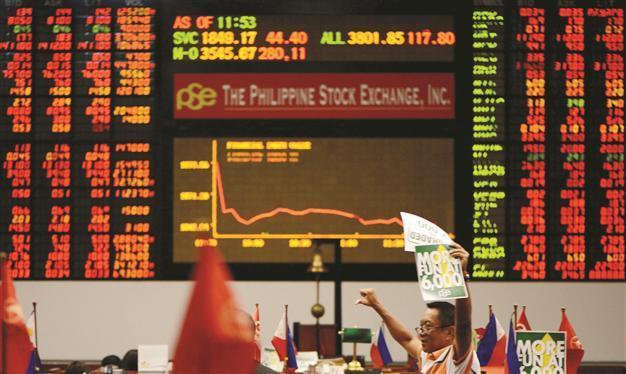Global shares, bonds rally after US Fed cools tapering talk