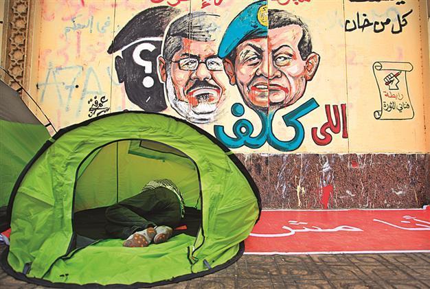 Egypts Morsi, opposition both defy army’s coup threat