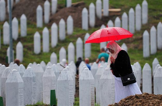 Bosnians rebury 409 massacre victims on Srebrenica anniversary