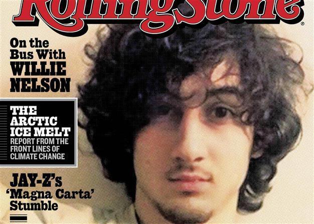 Policeman releases manhunt photos of accused Boston bomber