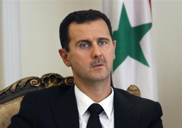 Al-Assad praises Egyptian militarys overthrow of Mohamed Morsi