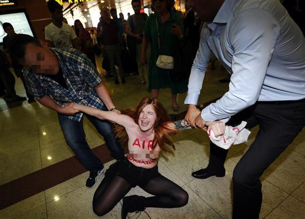 FEMEN topless activist protests Turkish PM