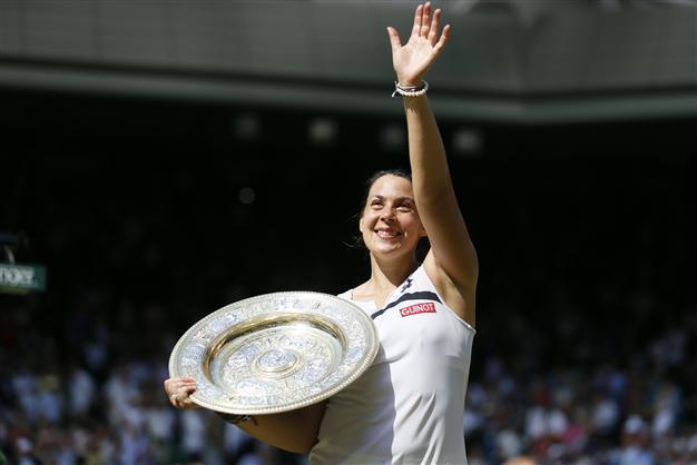 Bartoli routs Lisicki to win first Wimbledon title