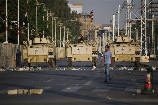 US envoy arrives as Egypt freezes assets of top Islamists