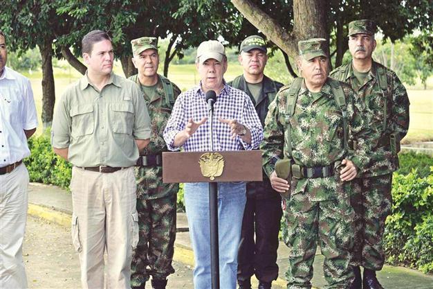 Colombian President Santos vows firm assault on FARC