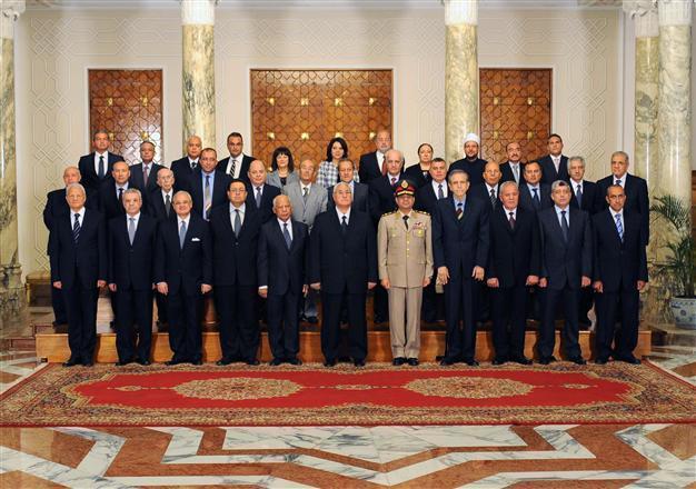 Egypt swears in first cabinet since Morsi ouster, army chief al-Sisi appointed deputy PM