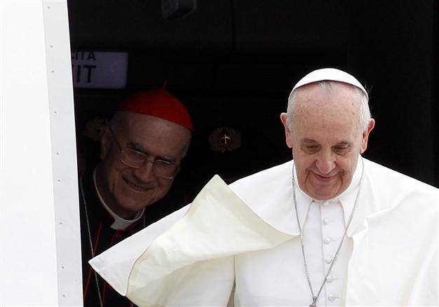Pope says gays must not be judged or marginalized
