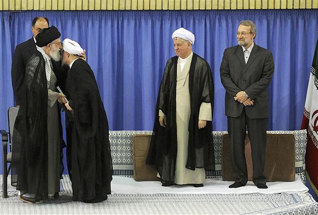 Irans Rowhani takes office with vow to rescue economy