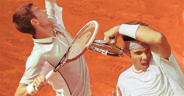 Nadal, Djokovic to meet in French Open semifinals