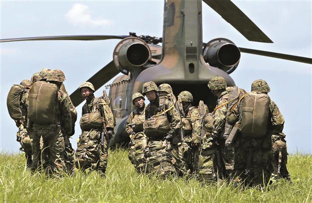 Japan eyeing Marines, drones in defense paper: Reports
