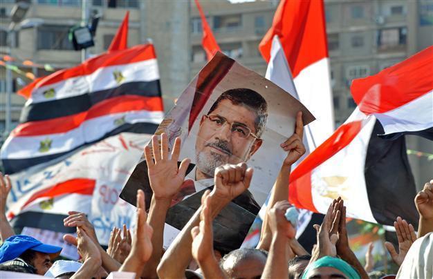 Hamas denounces Egypt over Morsi detention as clashes break out in Cairo