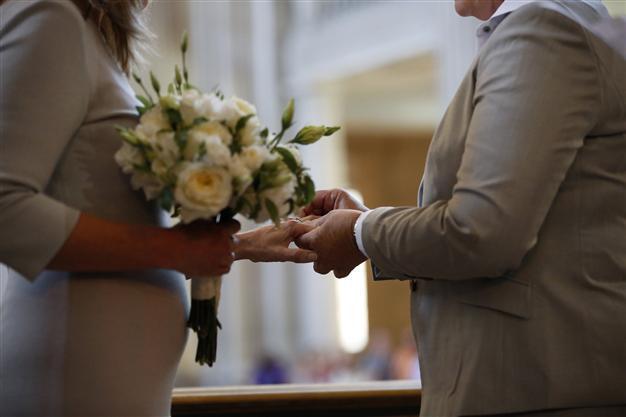Lesbian couple forced to recognise biological fathers rights
