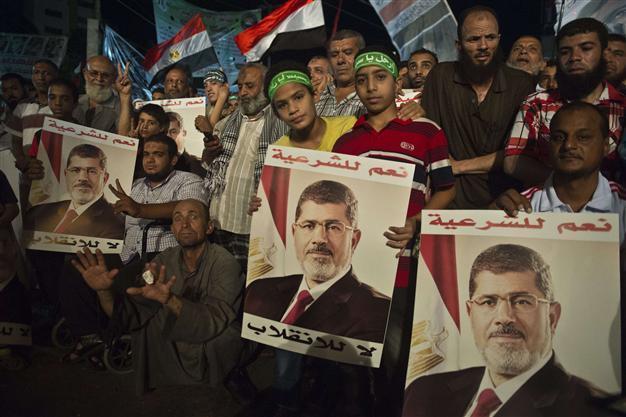 Morsi backers plan fresh rallies, defying Egypts police