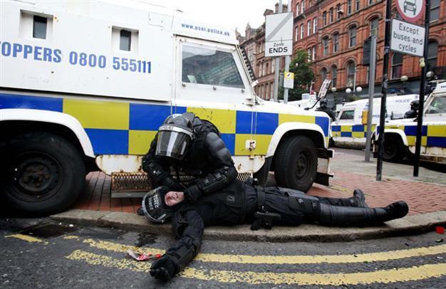 Dozens of police injured in Belfast clashes